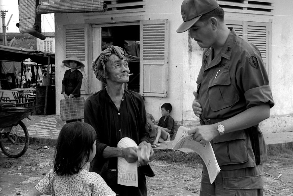 Soldier talking to civilian
